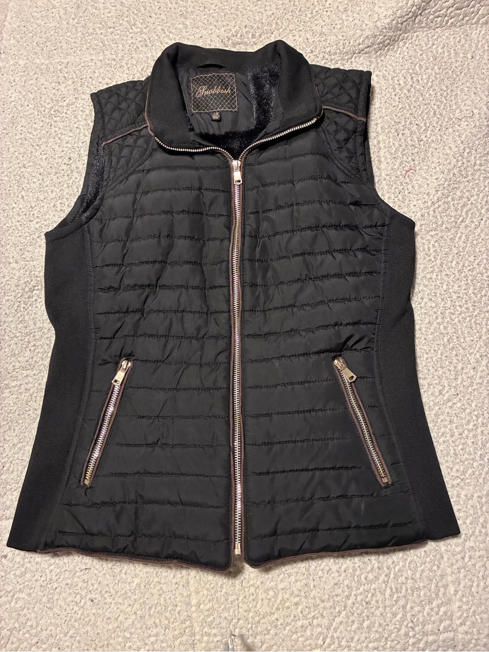 Quilted Black Zip-Front Vest with Gold-Zip Accents